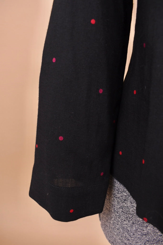 The sleeve cuff is seen up close.