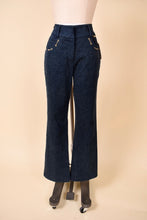 Load image into Gallery viewer, Vintage Y2K denim navy jeans by St. John are shown from the front. This boot cut jeans have a flare leg. 
