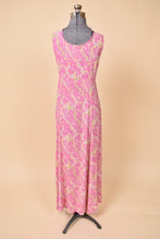 Load image into Gallery viewer, Vintage eighties pink and green floral print paisley dress is shown from the back. This dress is maxi length. 
