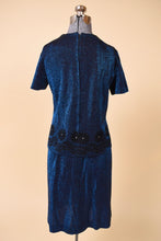 Load image into Gallery viewer, Vintage sixties navy sparkly two piece lurex set is shown from the back. This set has a zipper down the back. 
