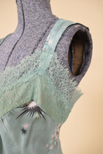 Load image into Gallery viewer, Vintage seafoam green silk sleepwear tank top is shown in close up. This tank top has a floral lace trim at the bust. 
