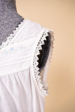 Load image into Gallery viewer, Vintage white cotton nightgown dress with lace trim is shown in close up. 

