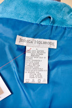 Load image into Gallery viewer, Vintage 90&#39;s lined suede colorful blue blazer is shown in close up. This blazer has a tag that reads Jessica Holbrook. 
