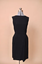 Load image into Gallery viewer, The front of the dress has the classic little black dress design.
