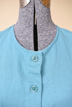 Load image into Gallery viewer, Vintage light blue linen and cotton button up tank top by Willi Wear is shown in close up. 

