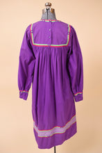 Load image into Gallery viewer, Vintage seventies purple tunic dress is shown from the back. This dress is a midi length.
