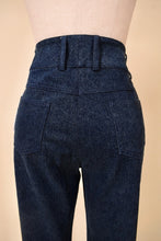 Load image into Gallery viewer, Vintage 2000&#39;s designer St John mid rise navy jeans are shown in close up. These jeans have two back pockets. 

