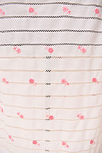 Load image into Gallery viewer, Vintage white and pink embroidered floral slip skirt is shown in close up. 
