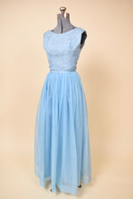 Load image into Gallery viewer, Vintage sky blue handmade princess sleeveless maxi dress is shown from the side. This dress has a big puffy organza skirt. 
