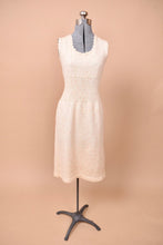 Load image into Gallery viewer, The front of the dress is cinched in around the waist.
