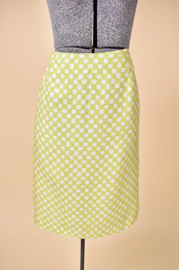 Vintage Y2K designer white and green checkered Versace skirt is shown from the front. This mini pencil skirt is lightweight. 