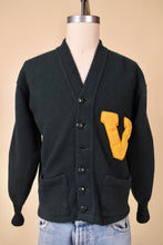 Load image into Gallery viewer, Vintage 1940&#39;s forest green UVM letterman sweater by Lanza is shown from the front. This green sweater has a yellow V on the front. 
