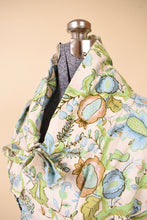 Load image into Gallery viewer, Vintage handmade 50&#39;s floral crop top is shown in close up. This top has a high neckline. 
