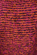 Load image into Gallery viewer, Vintage fuzzy knit pink, orange, and black boucle wool cape by Donegal Design is shown in close up. 

