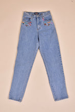 Load image into Gallery viewer, Vintage 1990&#39;s lightwash beaded denim jeans are shown from the front. 
