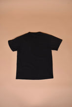 Load image into Gallery viewer, Vintage 2000s black cotton country music tour tee by Delta is shown from the back.
