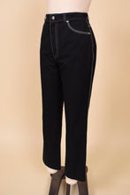 Load image into Gallery viewer, Vintage black Escada embroidered trousers are shown in close up. These trousers have a flare fit. 
