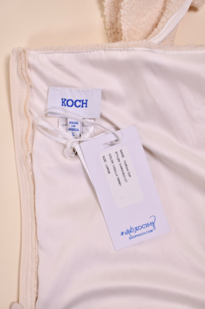 Vintage Y2K ruffled terrycloth top by Koch is shown in close up. This top is by the brand Koch. 