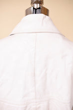 Load image into Gallery viewer, Vintage 60&#39;s white leather swing jacket by Sills Bonnie Cashin is shown from the back. This jacket has a collar. 
