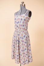 Load image into Gallery viewer, Vintage handmade cartoon print striped midi dress is shown in close up. 
