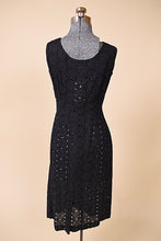Load image into Gallery viewer, Vintage fifties black cotton sheer eyelet midi dress by Puritan is shown from the back. 
