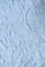 Load image into Gallery viewer, Vintage powder blue puffy brocade princess dress is shown in close up. 
