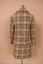 Load image into Gallery viewer, Vintage sixties Peck and Peck classic tweed skirt and blazer set is shown from the back. This set has a brown and tan wool knit. 
