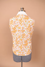 Load image into Gallery viewer, Vintage 1970&#39;s orange and green bird print collared shirt is shown from the back. This shirt is sleeveless.
