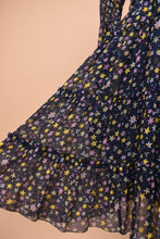 Load image into Gallery viewer, Zadig and Voltaire ruffled navy blue star print dress is shown in close up. This dress has a ruffle at the bottom hem.
