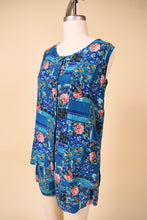 Load image into Gallery viewer, Vintage blue patchwork print two piece set is shown in close up. This set has boxer shorts and a sleeveless tank.
