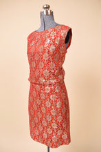 Load image into Gallery viewer, Vintage 60&#39;s red mini dress by Algo is shown from the side. This dress has a sparkly gold lace overlay. 
