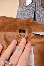 Load image into Gallery viewer, Vintage brown suede jacket is shown in close up. This jacket was made in Korea.
