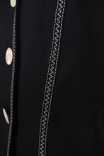 Load image into Gallery viewer, Vintage two piece black and white embroidered Escada pantsuit is shown in close up. This Escada suit has zig zag stitching. 
