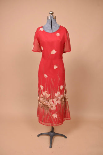 Vintage 1990's red lined sheer floral dress is shown from the front. This dress has short sheer sleeves.