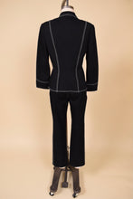Load image into Gallery viewer, Vintage western inspired Escada two piece black designer suit is shown from the back. 
