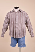 Load image into Gallery viewer, Vintage 1970&#39;s men&#39;s brown and white vertical stripe button down top is shown from the front. This dress shirt has a pointed collar. 
