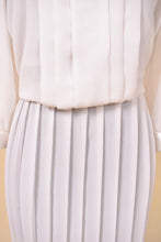 Load image into Gallery viewer, Vintage pleated rayon eighties drop waist dress by In The Mood is shown in close up. 
