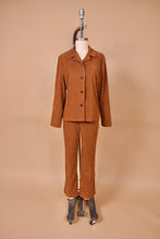 Load image into Gallery viewer, Vintage 1990&#39;s faux suede brown western inspired pantsuit is shown from the front. This two piece set has a blazer and bootcut pants.

