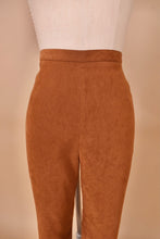 Load image into Gallery viewer, Vintage brown faux suede high waisted cowgirl pants are shown in close up. These pants have a high waisted fit.
