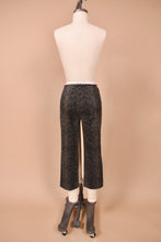 Load image into Gallery viewer, Vintage grey and black faux snakeskin cotton blend capri pants are shown from the back. 
