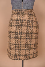 Load image into Gallery viewer, Vintage 60&#39;s tan and brown tweed wooly skirt is shown in close up. 
