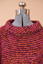 Load image into Gallery viewer, Vintage Irish wool knit sleeveless cape is shown in close up. This cape has a textural boucle knit. 

