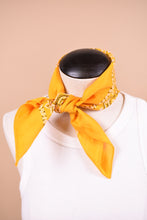 Load image into Gallery viewer, Vintage paisley print yellow bandana is shown in close up. This bandana is styled tied around the neck.
