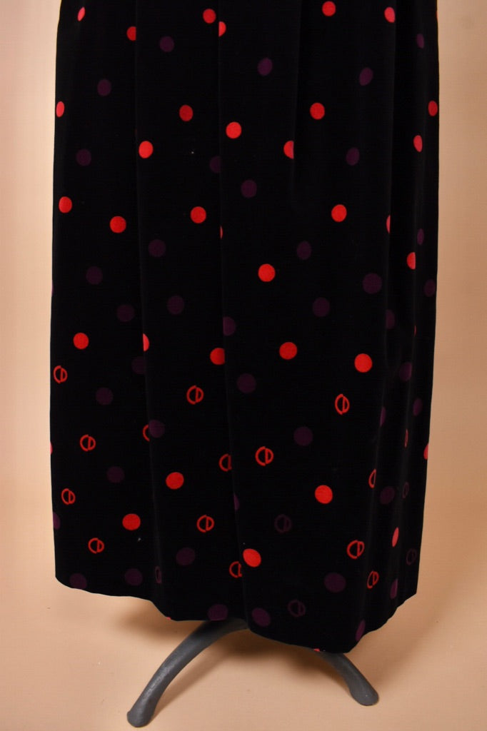 The bottom of the skirt is seen in detail.