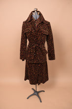 Load image into Gallery viewer, The set faces forward on the mannequin. The set is visible in full with the jacket layered over the top and skirt.
