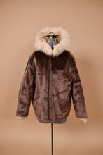 Load image into Gallery viewer, Vintage brown faux fur cropped jacket by Ulla for Bergdorf Goodman is shown from the front. This jacket is brown faux fur with a tan fuzzy trim.
