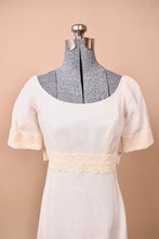 Load image into Gallery viewer, The top of the dress is seen in detail.
