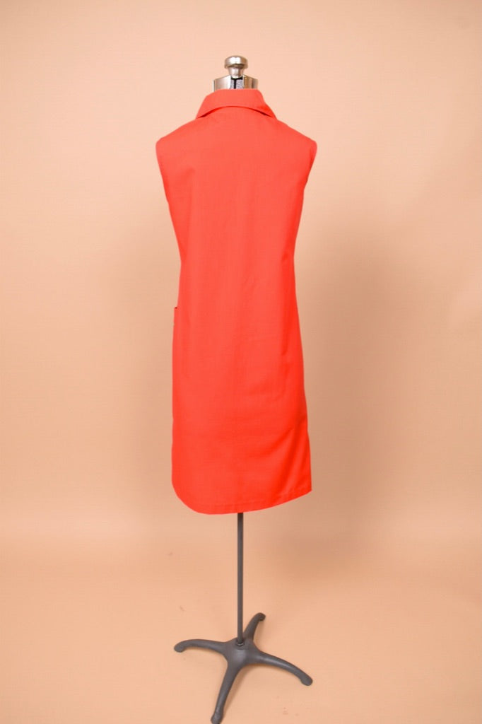 Vintage 1960's collared red dress shown from the back.