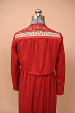 Load image into Gallery viewer, Vintage seventies red maxi dress and bolero set is shown from the back. This bolero jacket has slightly puffed shoulders.
