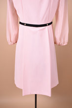 Load image into Gallery viewer, Vintage Ted Baker babydoll dress is shown from the back. This dress is a pale pink color.
